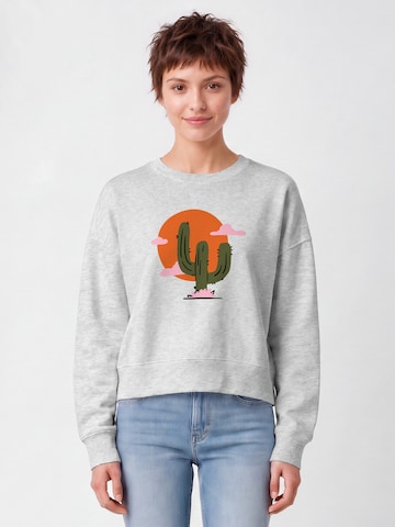 Watapparel Sweatshirt 'Kaktus im Sonnenuntergang' in Grijs: voorkant
