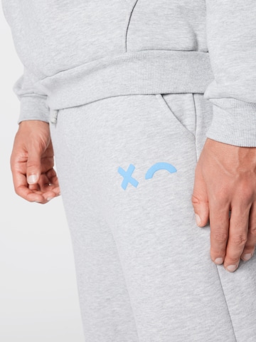 ABOUT YOU Limited Regular Sweatpants 'Tyler' NMWD by WILSN in Grau