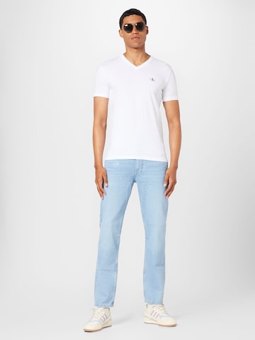 regular Jeans 'MERCER' di TOMMY HILFIGER in blu