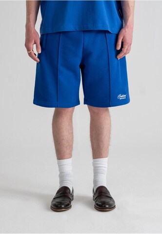 Prohibited Loose fit Pants 'Hometown' in Blue: front