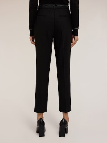MOTIVI Regular Trousers in Black