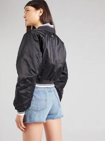 Tommy Jeans Between-Season Jacket 'VARSITY' in Black