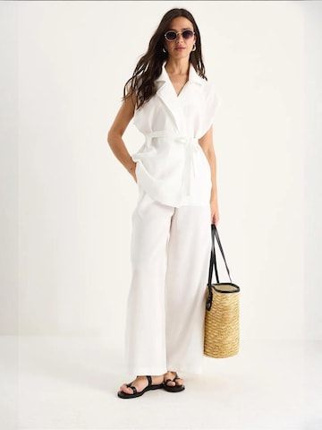 Pantalons de tailleur Bianco Lucci en blanc