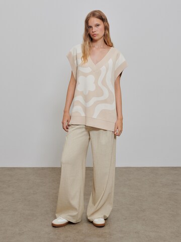 florence by mills exclusive for ABOUT YOU Wide leg Pleat-front trousers 'Foliage' in Beige