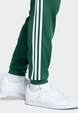 Effilé Pantalon fonctionnel 'Sst' ADIDAS ORIGINALS en vert
