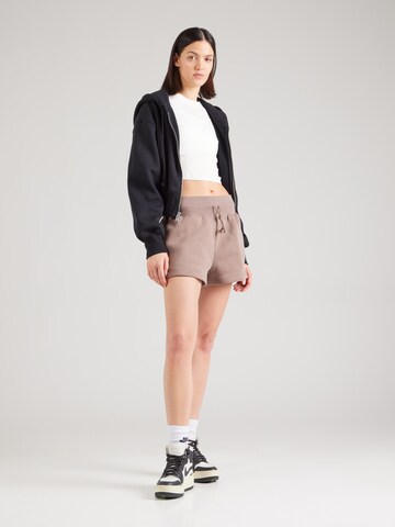 Nike Sportswear Loose fit Trousers 'Phoenix Fleece' in Brown