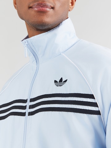 ADIDAS ORIGINALS Kurtka przejściowa w kolorze niebieski
