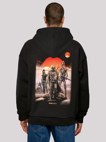 Sweat-shirt 'Star Wars The Mandalorian Warriors' F4NT4STIC en noir : devant