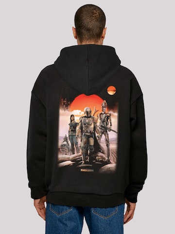 F4NT4STIC Sweatshirt 'Star Wars The Mandalorian Warriors' in Zwart: voorkant