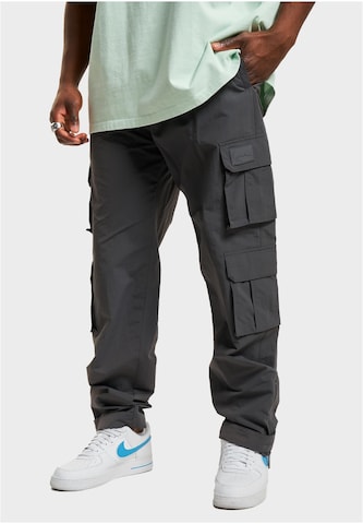 Karl Kani Tapered Cargo Pants in Grey: front