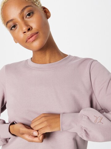 PUMA Sports sweatshirt 'EXHALE' in Pink