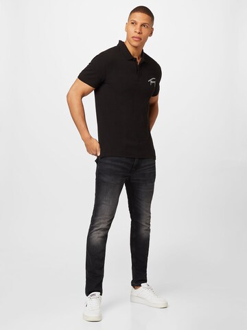 Tommy Jeans - Camiseta en negro