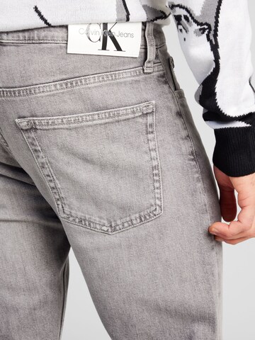 Coupe slim Jean 'SLIM' Calvin Klein Jeans en gris