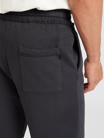 Bootcut Pantaloni 'CORE' di SCOTCH & SODA in nero