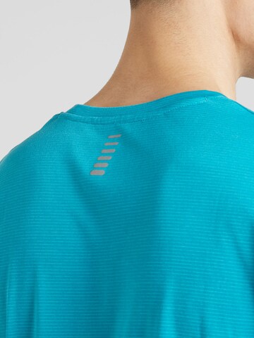 T-Shirt fonctionnel 'Launch' UNDER ARMOUR en bleu