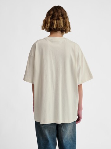 T-Shirt 'Headball' Hummel en blanc