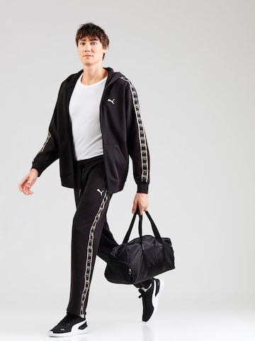 PUMA Loosefit Byxa 'ESS ELEVATED' i svart