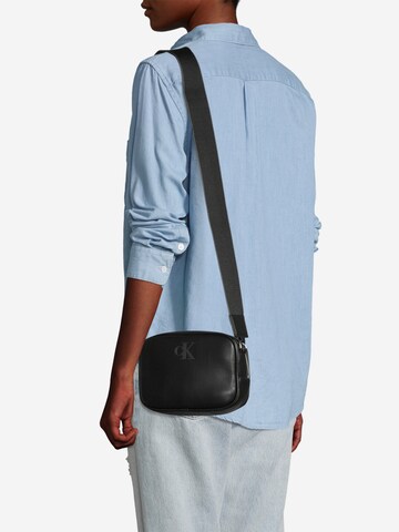 Calvin Klein Jeans Crossbody Bag in Black