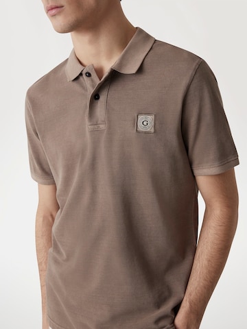 GUESS Poloshirt in Braun