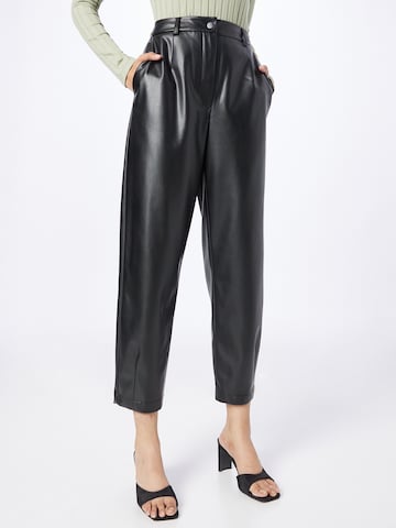 Karo Kauer Loose fit Pleat-front trousers in Black: front