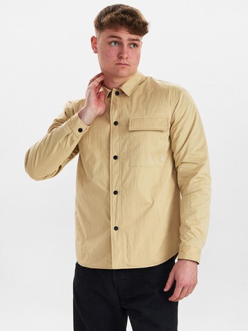 Dxnmxrk Tussenjas 'DXEbenezer' in Beige: voorkant