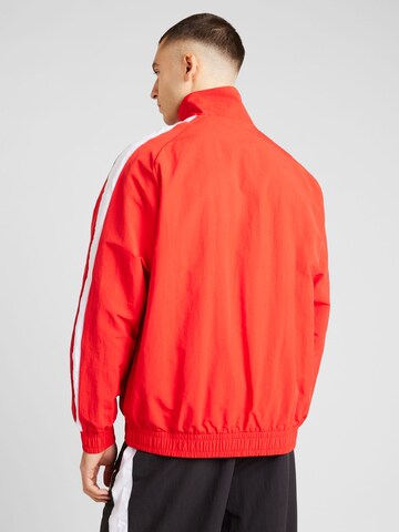 PUMA Спортивная куртка в Красный