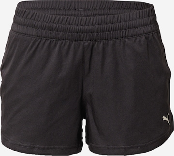 PUMA Regular Sports trousers in Black: front