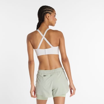 new balance - Soutien Bustier Soutien de desporto em branco