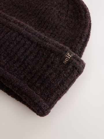 Bonnet self. en marron