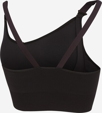 Bustino Reggiseno sportivo di Reebok in nero