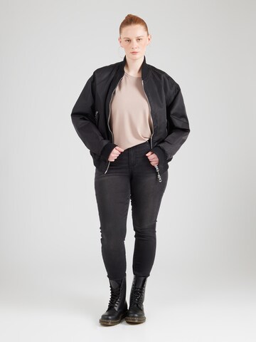 Maglietta di ONLY Carmakoma in beige