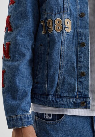 Veste mi-saison Karl Kani en bleu