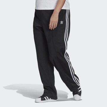 ADIDAS ORIGINALS Regular Workout Pants in Black: front