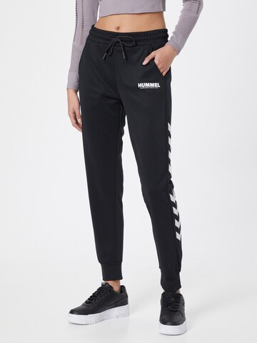 Hummel - Tapered Pantalón deportivo 'Legacy' en negro: frente