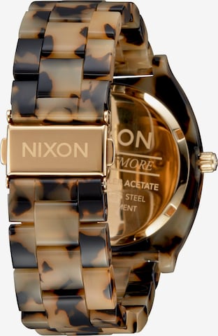 Montre à affichage analogique Nixon en beige