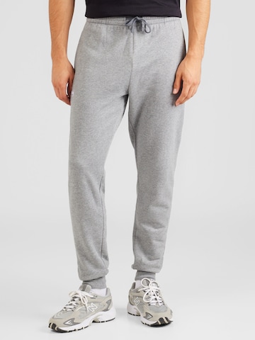 Tapered Pantaloni sport 'Rival' de la UNDER ARMOUR pe gri: față