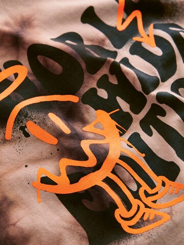 Tricou de la Next pe maro
