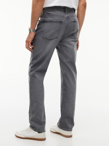 Tommy Jeans regular Jeans 'RYAN' i grå