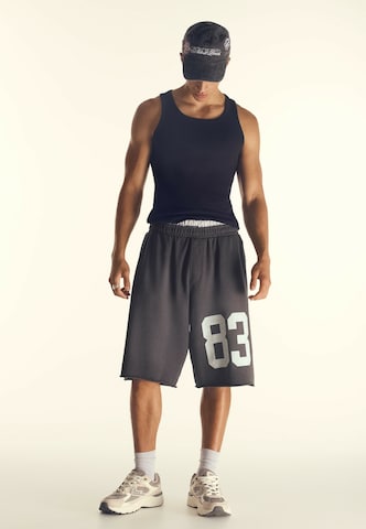 Baggy Pantaloni de la Bershka pe negru