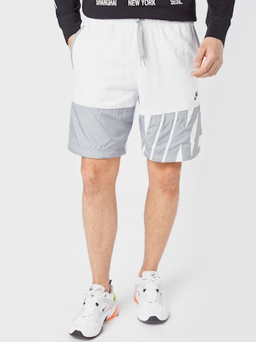 Nike Sportswear Широка кройка Панталон в бяло: отпред