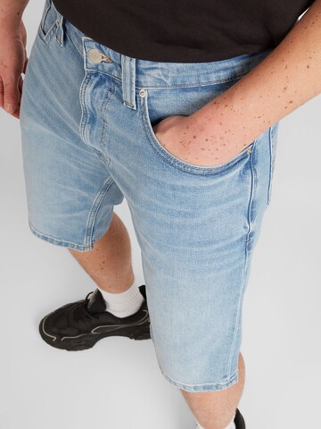 Tommy Jeans Normalny krój Jeansy 'Ronnie' w kolorze niebieski