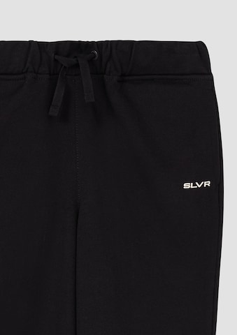 s.Oliver Tapered Trousers in Black