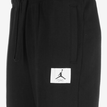 Effilé Pantalon de sport Jordan en noir