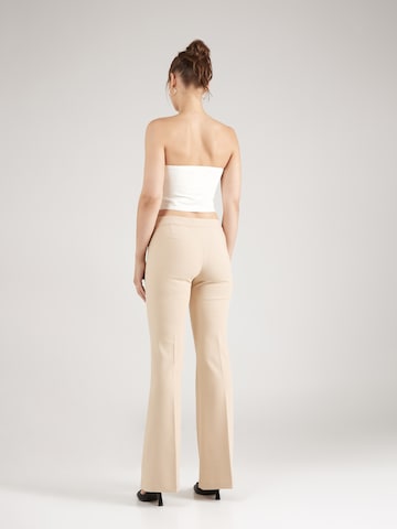 Flared Pantaloni con piega frontale 'Lena' di millane in beige