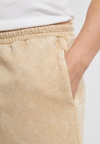 regular Pantaloni di Urban Classics in beige