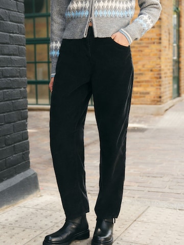 Next Tapered Trousers in Black: front