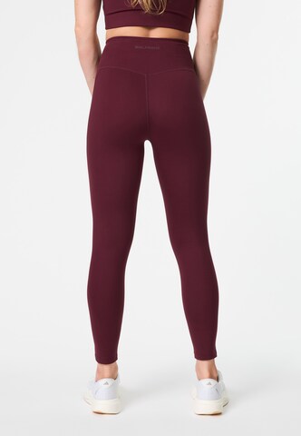 Skinny Pantalon de sport Girlfriend Collective en rouge