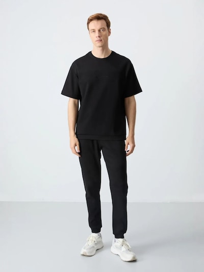 Tommy Life Survêtement en L en noir, Vue avec produit