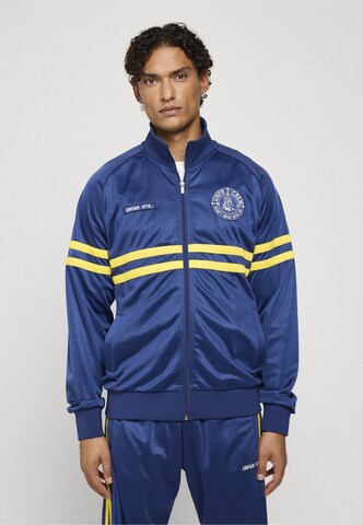 Giacca per l'allenamento 'Dmwu' di Unfair Athletics in blu: frontale
