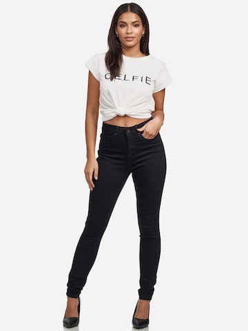 Skinny Jeans 'F101' di Tazzio in nero